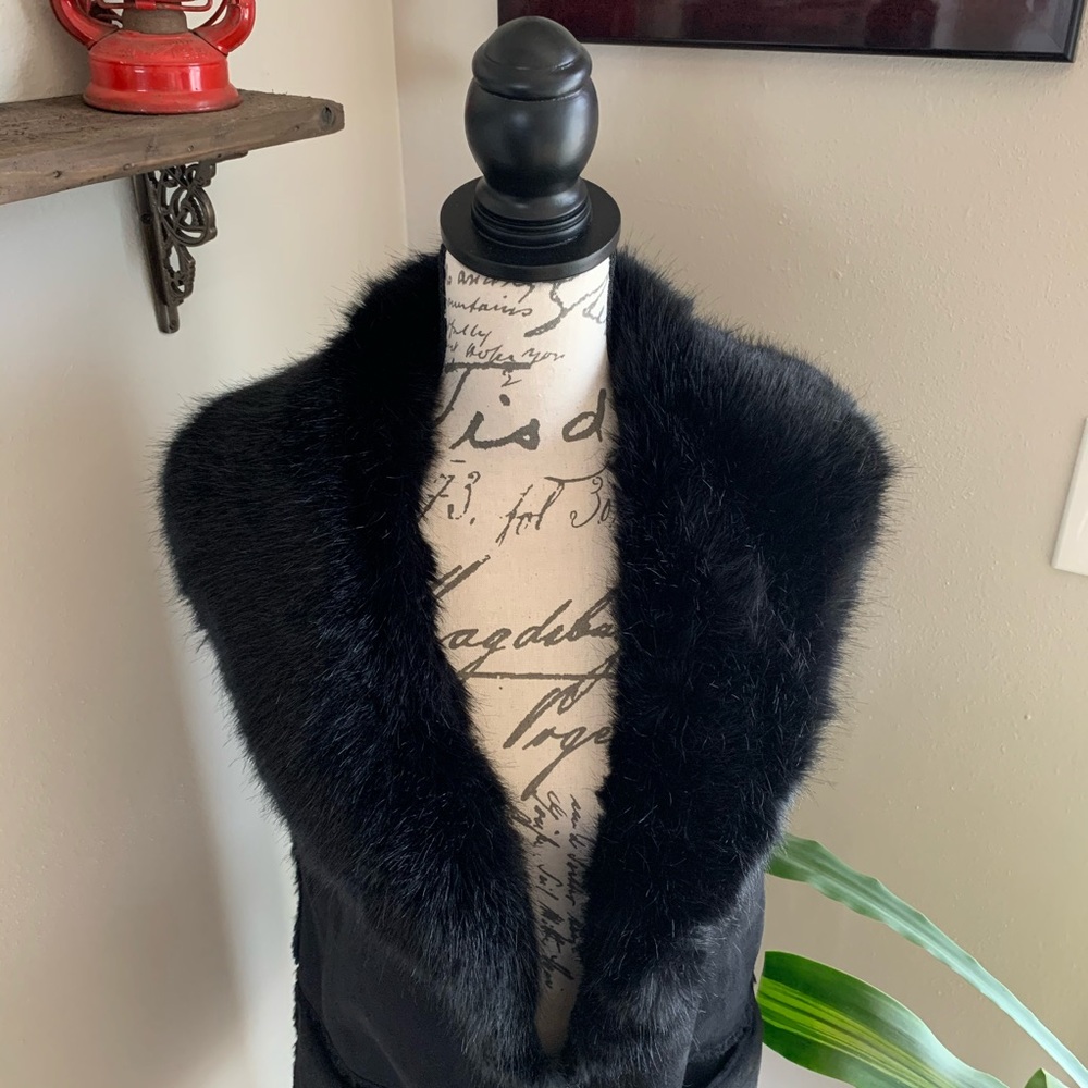 Long black fur vest